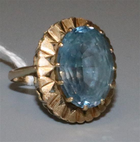 9ct gold dress ring set oval blue stone in textured mount